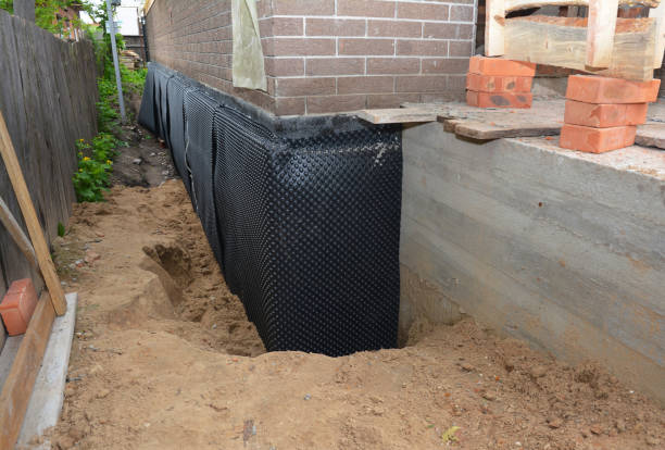 Happy homeowners after waterproofing job in Leonardtown